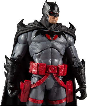 Close-up of McFarlane DC Batman Flashpoint 7-inch action figure showing chest emblem and red utility belt details.